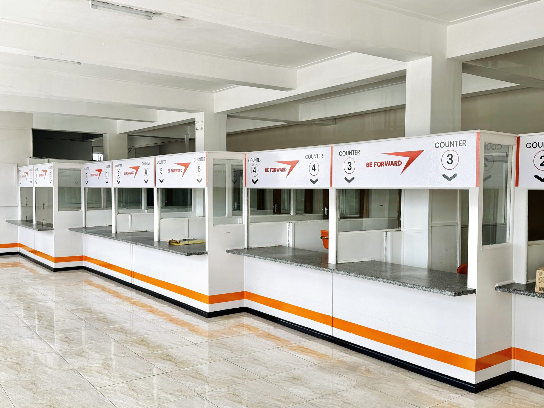 Branded BE FORWARD service desk counters