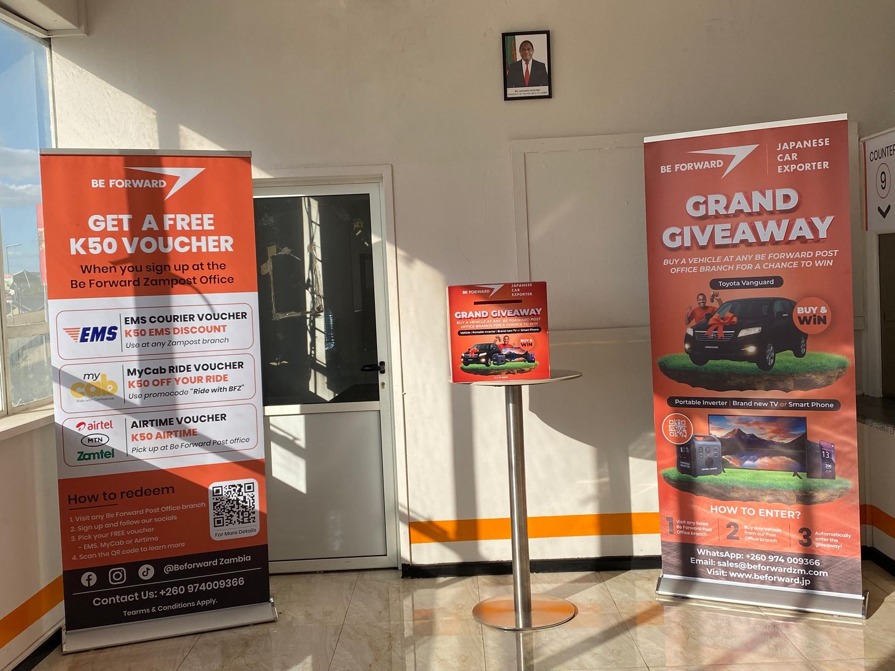 BE FORWARD campaign displays and rollup banners inside a branch