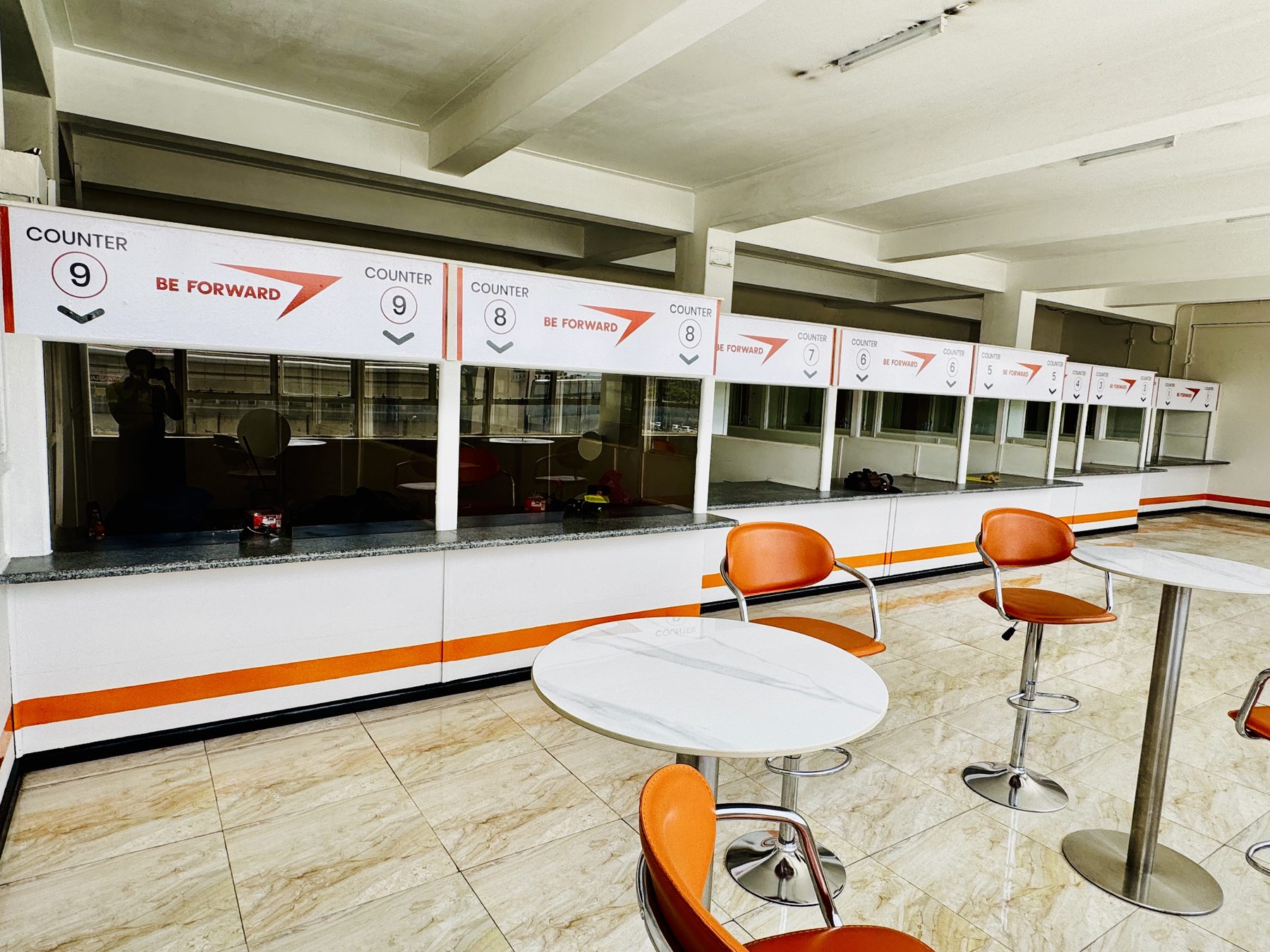 Branded BE FORWARD service desk counters