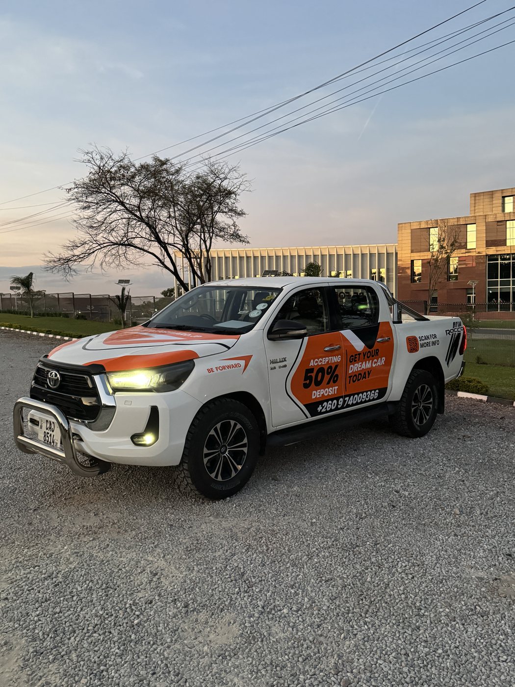 BE FORWARD branded pickup at dusk with full vehicle livery