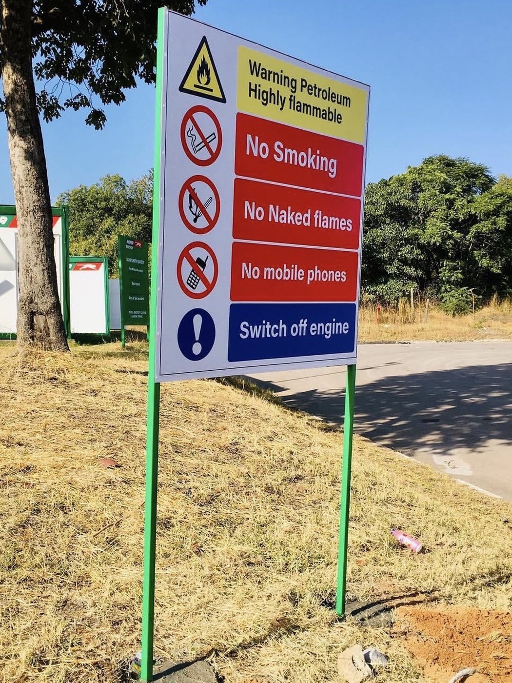 Warning Petroleum safety sign installed at a PUMA Energy forecourt