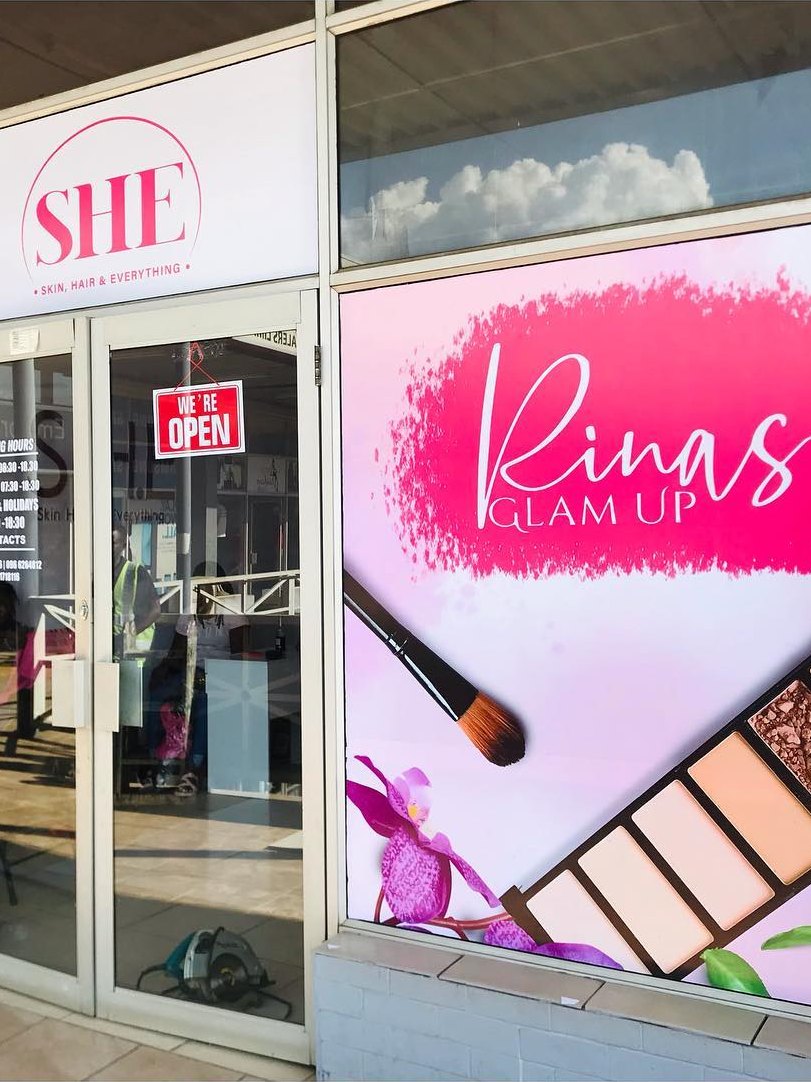 SHE and Rinas Glam Up branded shopfront window graphics
