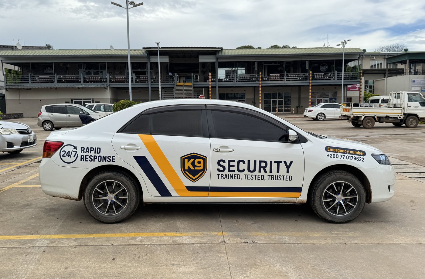 K9 Security branded patrol car with rapid response livery