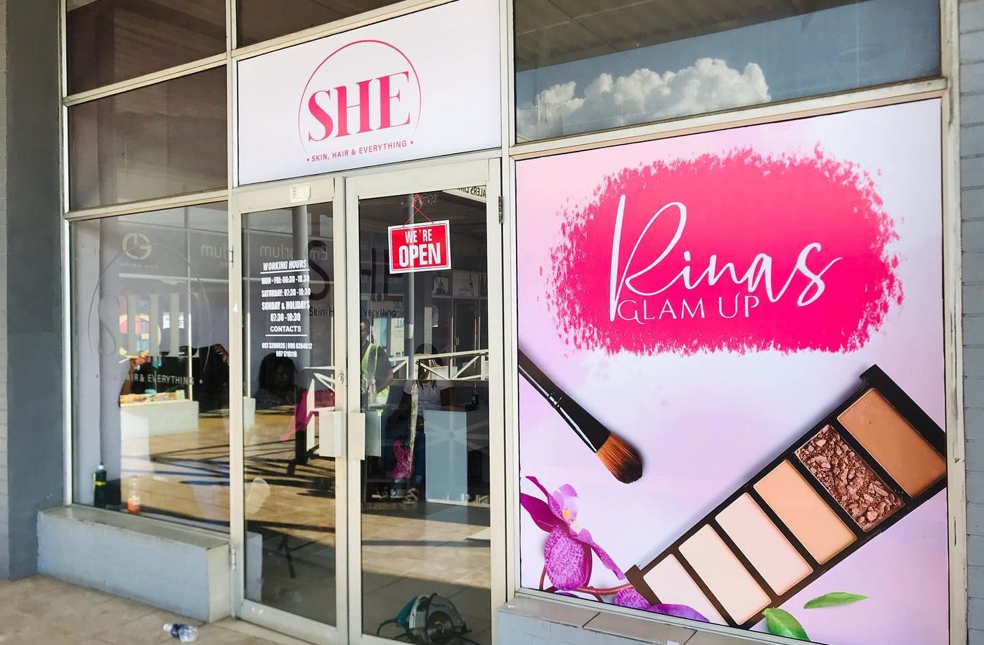 SHE and Rinas Glam Up branded shopfront window graphics